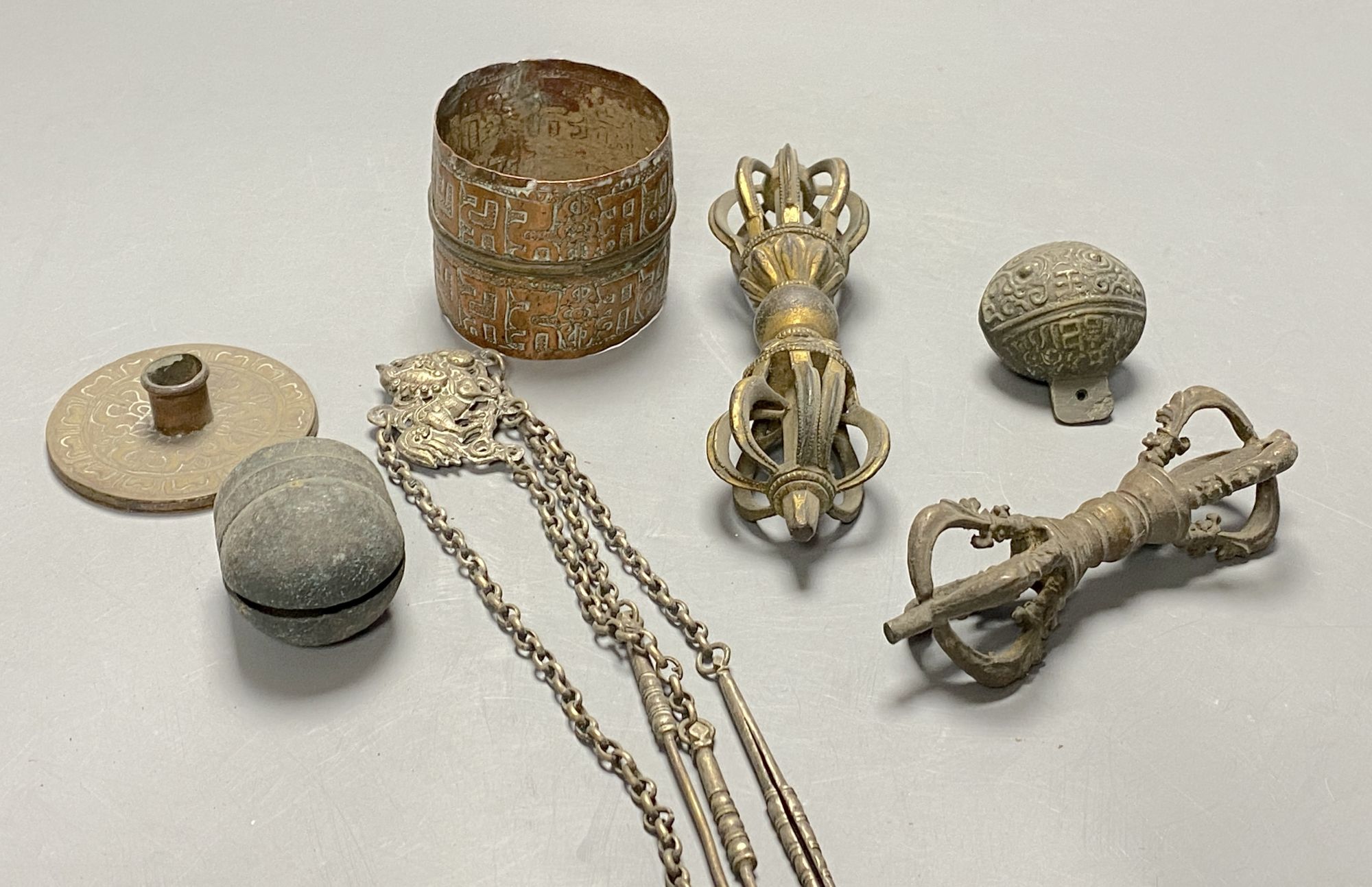 Two Tibetan bronze vajra sceptres and other Buddhist implements, 19th century